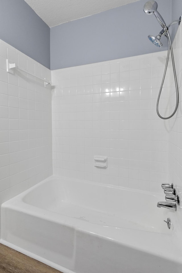 bathroom featuring tub / shower combination