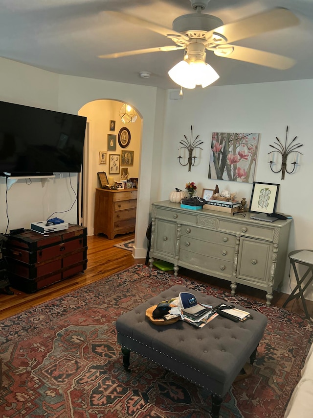 interior space featuring hardwood / wood-style flooring and ceiling fan