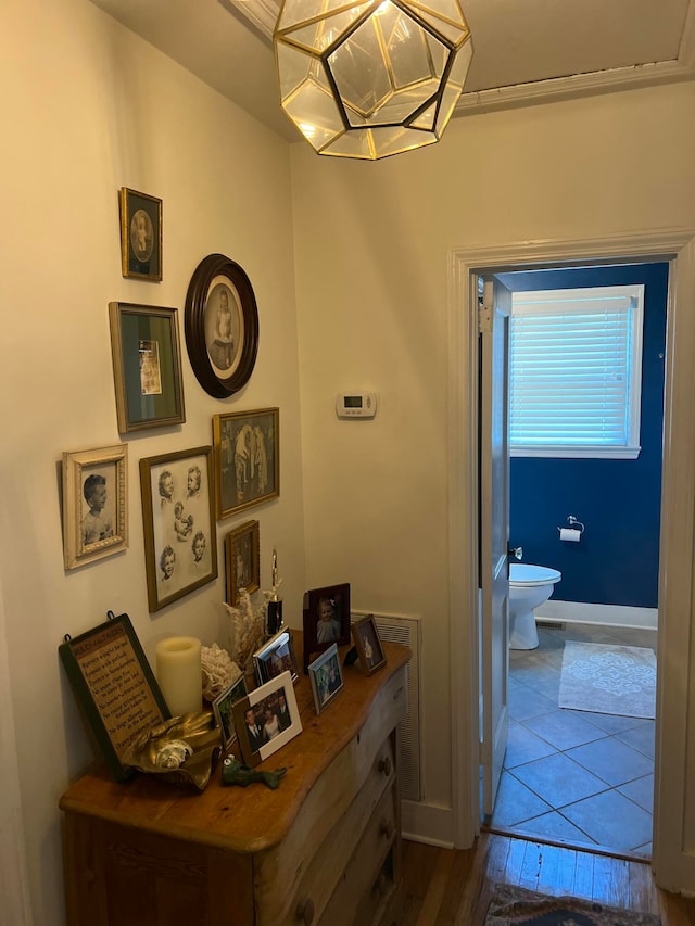 hallway featuring hardwood / wood-style floors