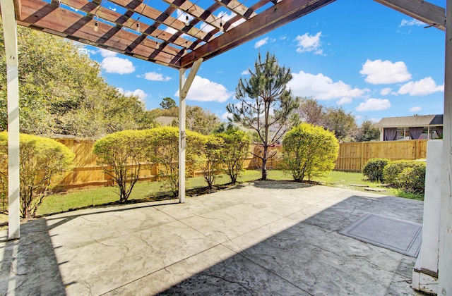 view of patio / terrace with a fenced backyard and a pergola