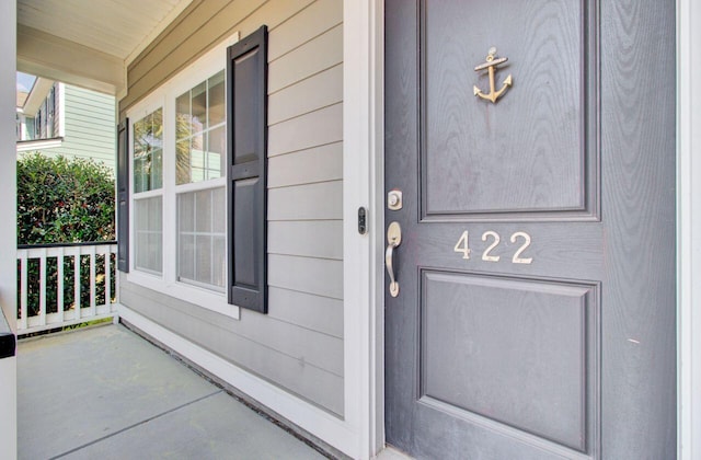 entrance to property with a porch