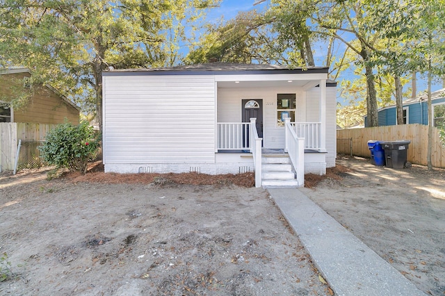 view of front of home featuring covered porch