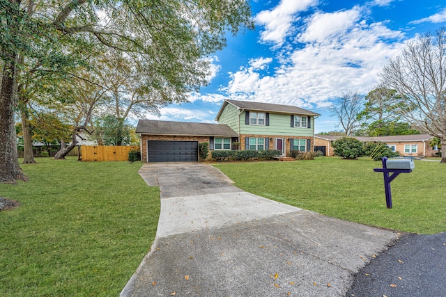 view of front facade with a garage and a front lawn