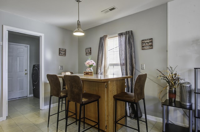 dining space with washer / dryer