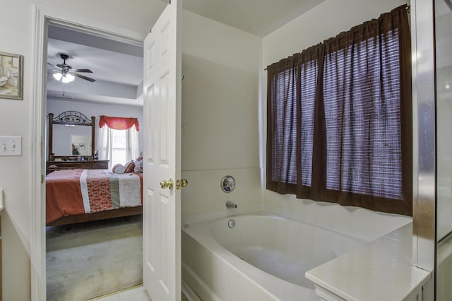 bathroom featuring a bath and ceiling fan