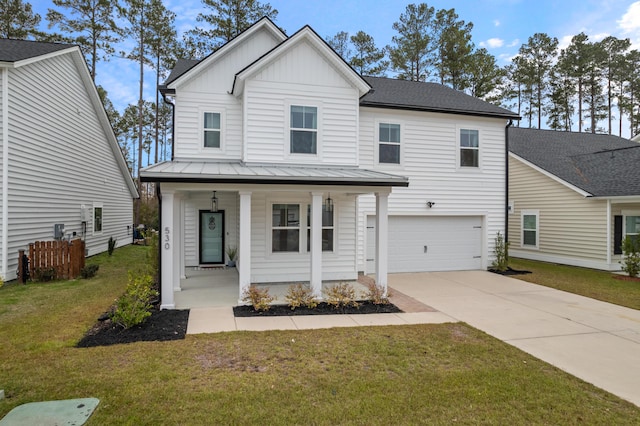 view of front of property featuring covered porch, a front yard, and a garage