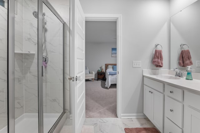 bathroom featuring an enclosed shower and vanity