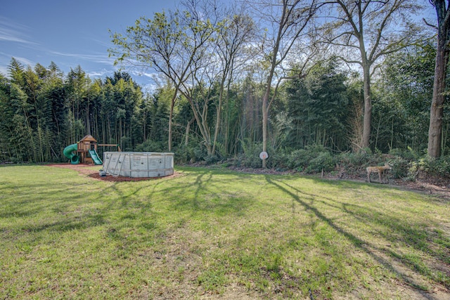view of yard featuring a playground