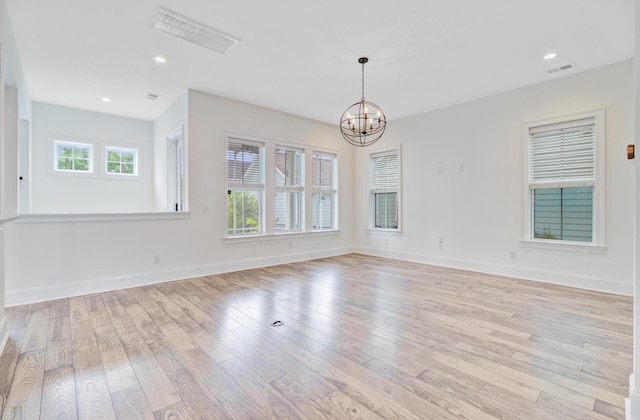 1485 Bourne Xing, Mount Pleasant, SC 29466 - spare room featuring a chandelier, light wood-style floors, and recessed lighting