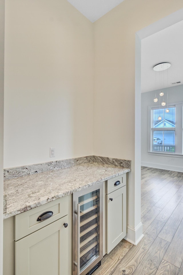 1485 Bourne Xing, Mount Pleasant, SC 29466 - indoor dry bar with wine cooler and light wood-type flooring