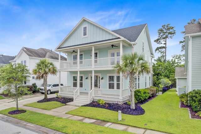 1485 Bourne Xing, Mount Pleasant, SC 29466 - view of front of home featuring a porch, board and batten siding, ceiling fan, a balcony, and a front yard