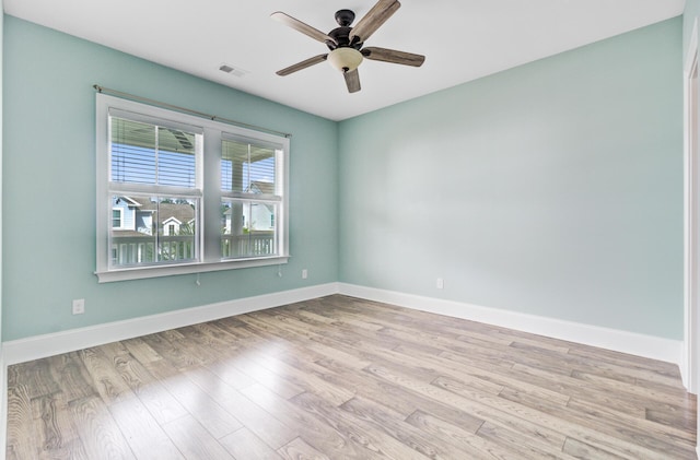 1485 Bourne Xing, Mount Pleasant, SC 29466 - empty room with a ceiling fan and wood finished floors