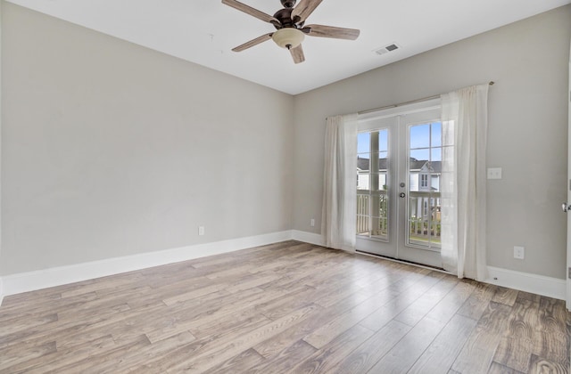 1485 Bourne Xing, Mount Pleasant, SC 29466 - empty room featuring light wood finished floors, ceiling fan, and french doors
