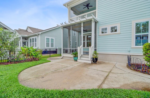 1485 Bourne Xing, Mount Pleasant, SC 29466 - rear view of property featuring ceiling fan, a balcony, a patio area, and a sunroom