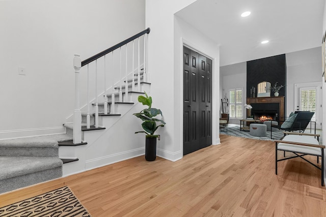 3385 Wayland Dr, Ladson, SC 29456 - foyer entrance featuring stairway, wood finished floors, recessed lighting, and a fireplace