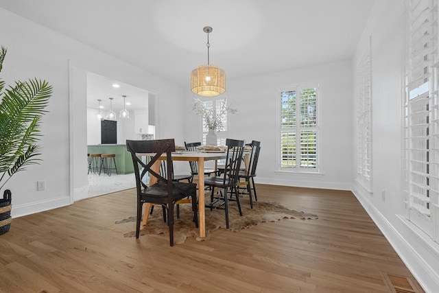 3385 Wayland Dr, Ladson, SC 29456 - dining space featuring wood finished floors and baseboards
