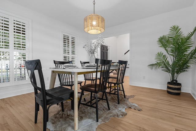 3385 Wayland Dr, Ladson, SC 29456 - dining area with light wood-style flooring and baseboards