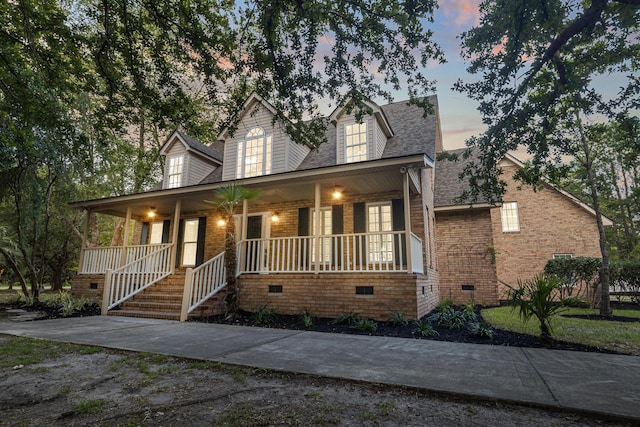 3385 Wayland Dr, Ladson, SC 29456 - view of front of house featuring covered porch, crawl space, brick siding, and a shingled roof