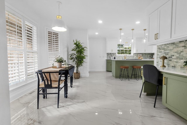 3385 Wayland Dr, Ladson, SC 29456 - dining space with light marble finish floors and recessed lighting