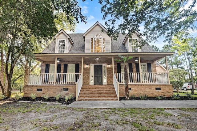 3385 Wayland Dr, Ladson, SC 29456 - cape cod home featuring a porch, a shingled roof, brick siding, and crawl space