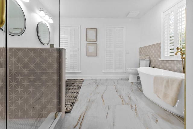 3385 Wayland Dr, Ladson, SC 29456 - bathroom with a freestanding tub, a wainscoted wall, a shower stall, marble finish floors, and vanity