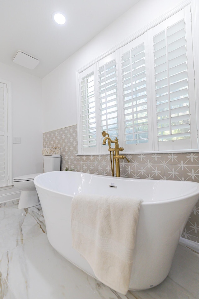 3385 Wayland Dr, Ladson, SC 29456 - bathroom featuring a freestanding bath and recessed lighting