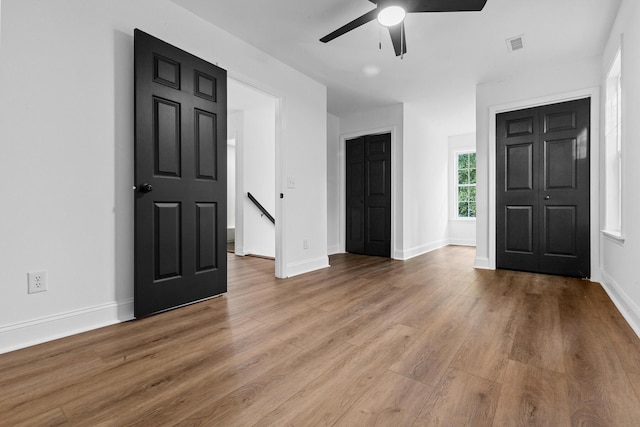 3385 Wayland Dr, Ladson, SC 29456 - unfurnished bedroom with wood finished floors and ceiling fan
