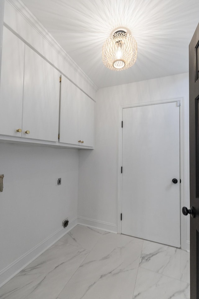 3385 Wayland Dr, Ladson, SC 29456 - washroom with cabinet space, hookup for an electric dryer, light marble finish flooring, and a chandelier