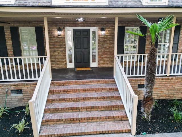 3385 Wayland Dr, Ladson, SC 29456 - view of exterior entry featuring a porch and brick siding