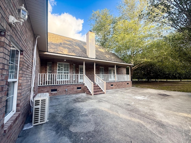 3385 Wayland Dr, Ladson, SC 29456 - view of front of home with crawl space, covered porch, a chimney, and brick siding