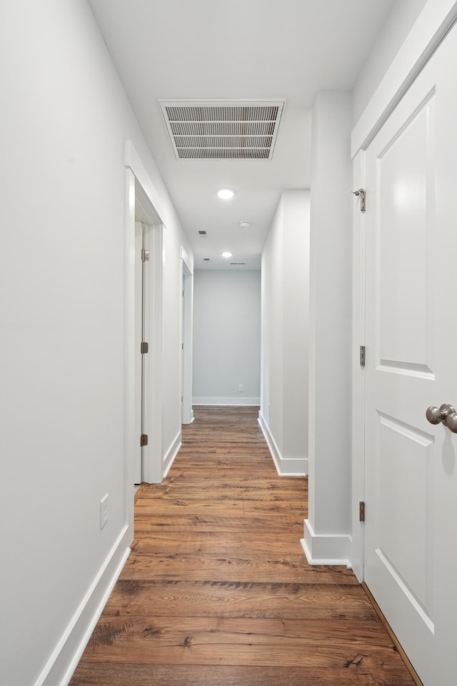 hallway featuring hardwood / wood-style flooring