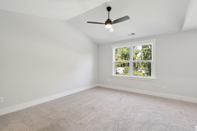 unfurnished room featuring carpet flooring, ceiling fan, and lofted ceiling