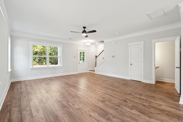 unfurnished living room with ceiling fan, hardwood / wood-style floors, and ornamental molding