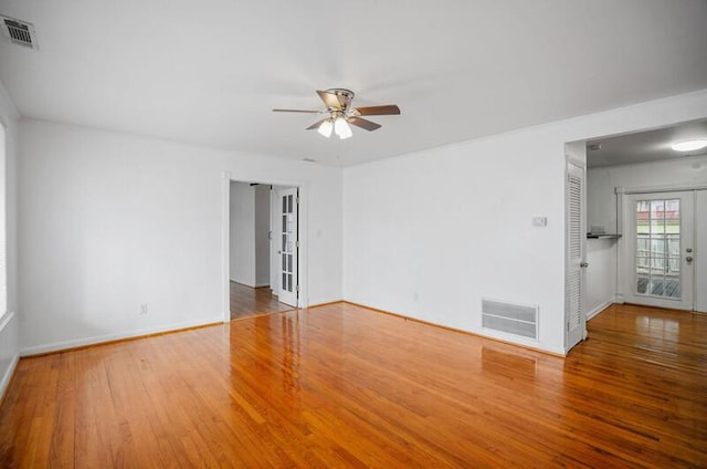 unfurnished room featuring ceiling fan and wood-type flooring