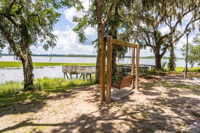 dock area featuring a water view