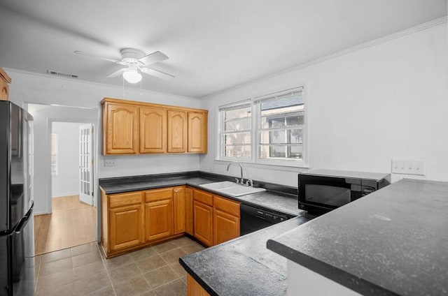 kitchen featuring sink, crown molding, ceiling fan, black appliances, and light tile patterned flooring