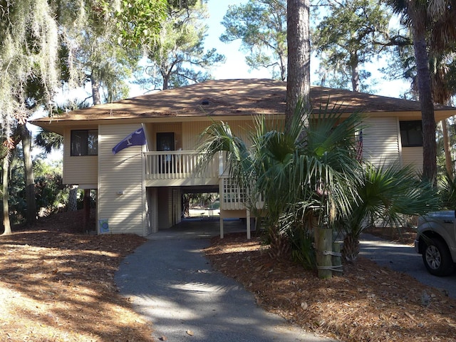 beach home with a carport and a balcony