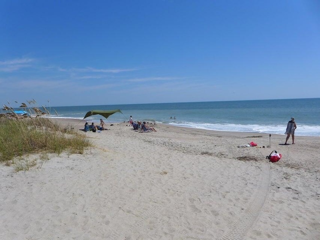 view of water feature with a beach view