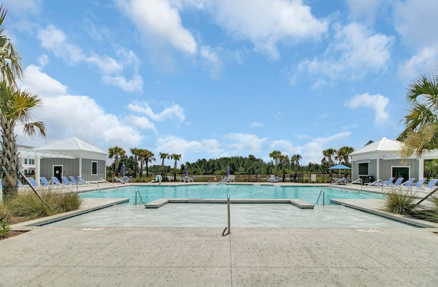 view of swimming pool featuring a patio area