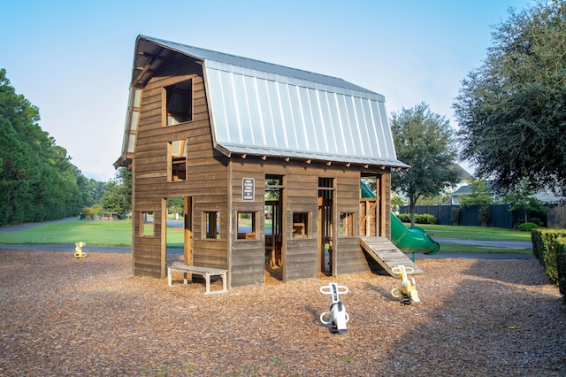 305 Archar St, Summerville, SC 29486 - view of front facade with a gambrel roof, a metal roof, a standing seam roof, and a playground