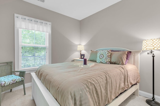 656 Coleman Blvd Unit 703, Mount Pleasant, SC 29464 - bedroom featuring light carpet and baseboards