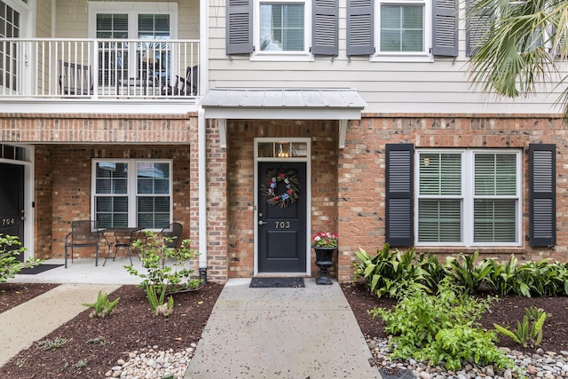 656 Coleman Blvd Unit 703, Mount Pleasant, SC 29464 - entrance to property featuring a balcony and brick siding