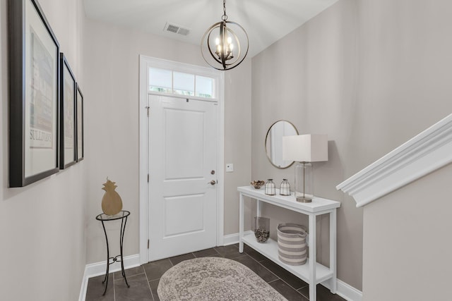 656 Coleman Blvd Unit 703, Mount Pleasant, SC 29464 - entrance foyer featuring a chandelier, dark tile patterned flooring, and baseboards