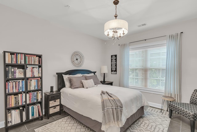 656 Coleman Blvd Unit 703, Mount Pleasant, SC 29464 - tiled bedroom featuring a chandelier and baseboards
