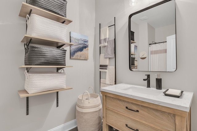 656 Coleman Blvd Unit 703, Mount Pleasant, SC 29464 - bathroom featuring baseboards and vanity