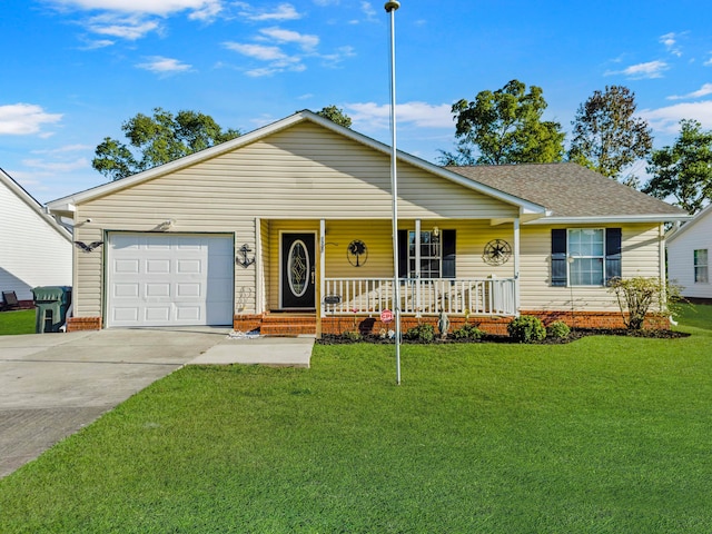 single story home featuring a garage, covered porch, and a front yard