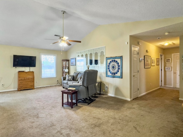 carpeted living room with lofted ceiling, a textured ceiling, and ceiling fan