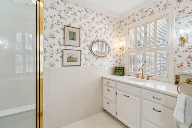 bathroom featuring ornamental molding, tile patterned floors, vanity, and wallpapered walls