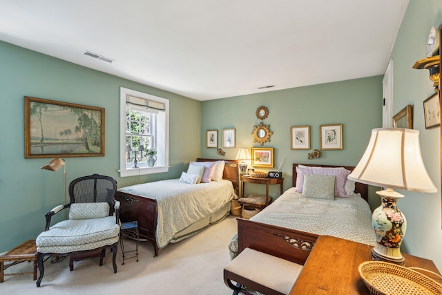 bedroom featuring carpet and visible vents