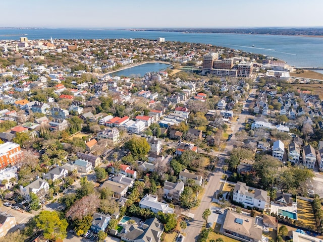 bird's eye view with a water view and a residential view